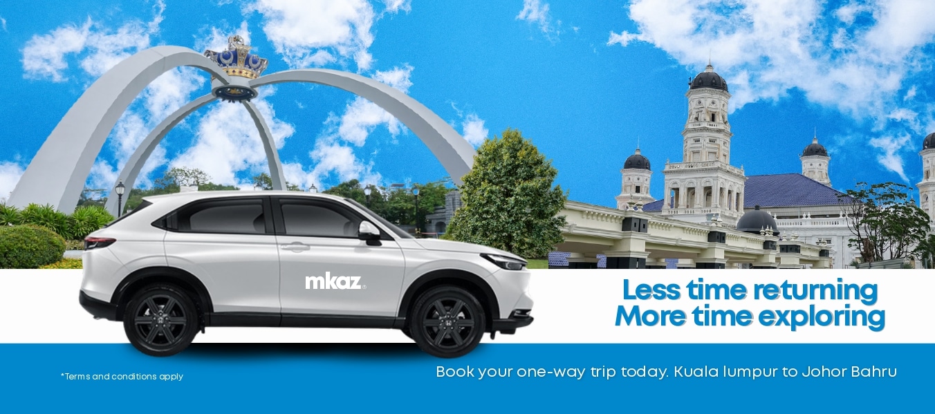 White MKAZ SUV on a blue-banner ad with a cityscape and iconic arch, promoting ‘Less time returning More time exploring’ for KL to Johor Bahru trips.