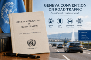geneva convention - MKAZ Car Rental - MKAZ Car Rental A large beige UN Geneva Convention on Road Traffic document on a desk with a pen, UN flag in back, and a highway scene in the background promoting safer roads worldwide.